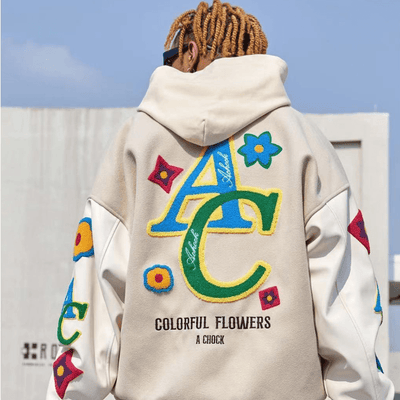 BEIGE VARSITY JACKET WITH FLORAL ACCENTS OVERSIZED COLLEGE JACKET