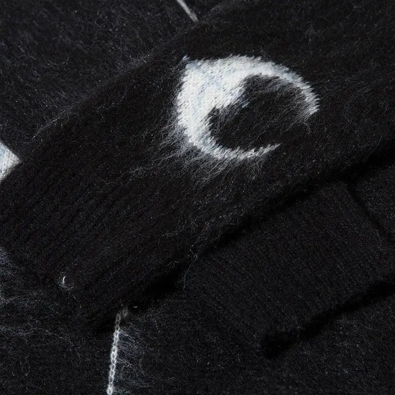 BLACK FUZZY SWEATER WITH STAR GRAPHIC AND LETTER DESIGNS