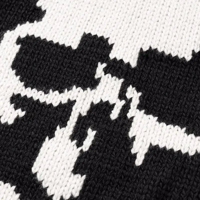 KNITTED SWEATER WITH SKULL AND CROSSBONES PATTERN KNITTED