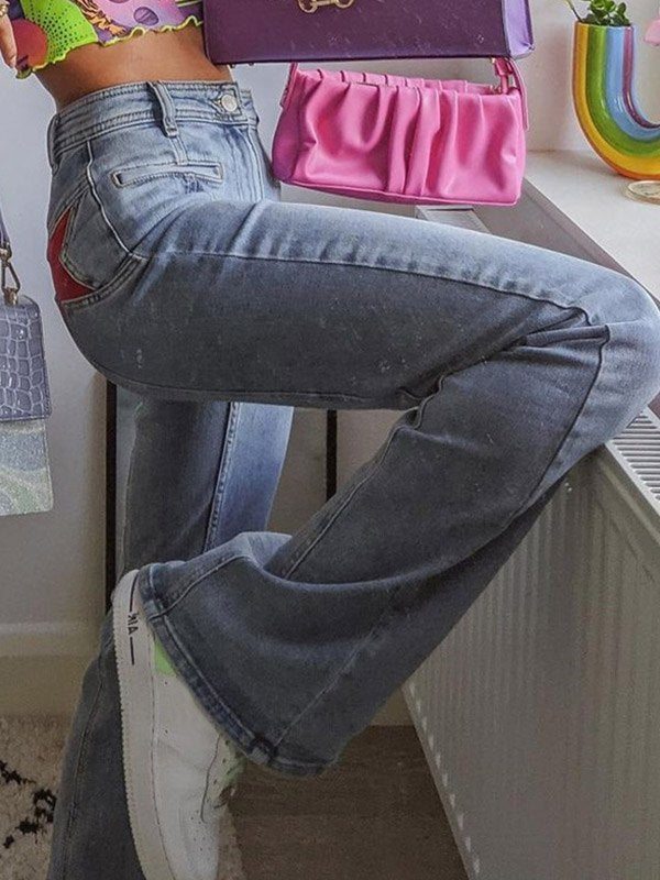 LIGHT BLUE HIGH-WAISTED FLARED TROUSERS WITH RED STAR DETAIL
