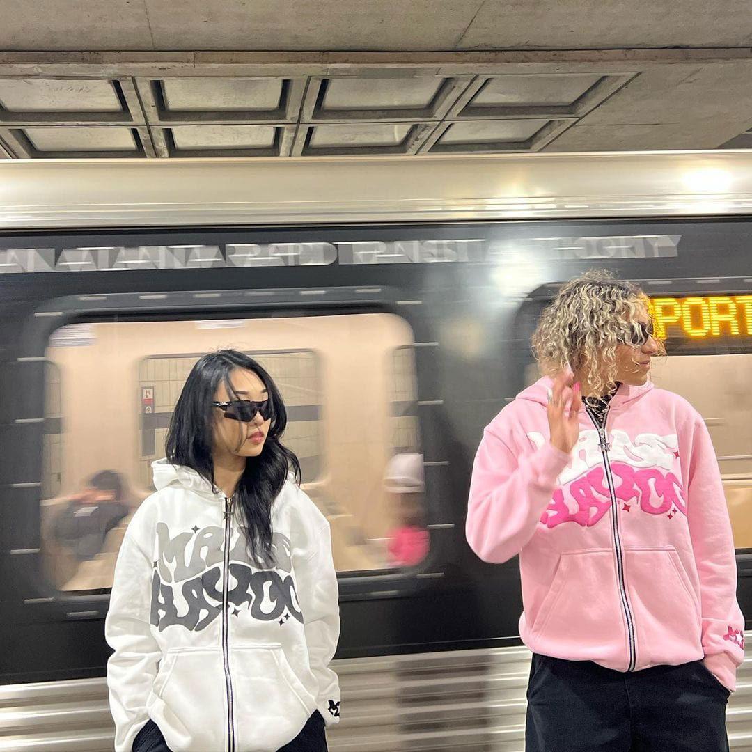 ZIP-UP HOODIE SUGAR GLOW ZIP-UP WITH RAISED LETTERING
